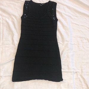 I’m selling a black party dress,